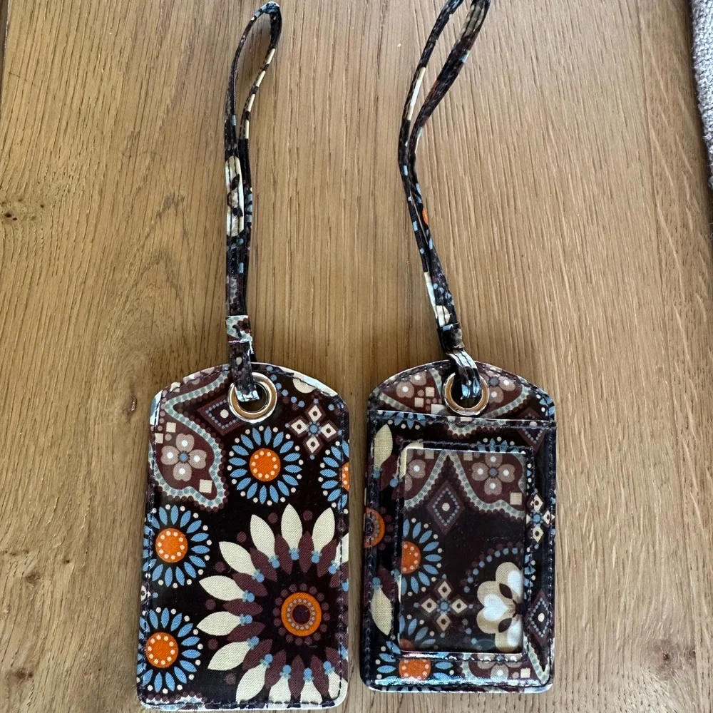 Vera Bradley luggage tags.